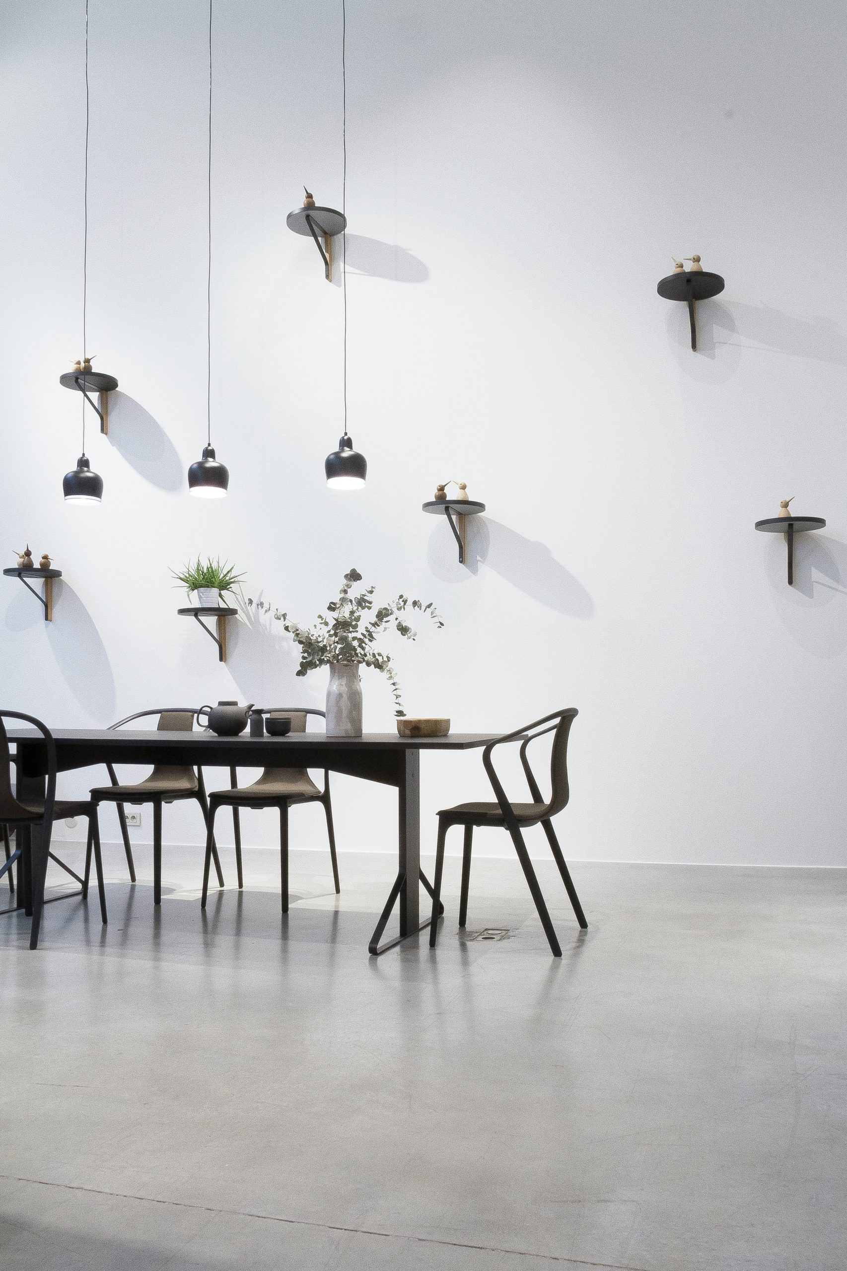 https://unsplash.com/photos/black-dining-set-near-white-wall-PVQnaFyePvU?utm_content=creditShareLink&utm_medium=referral&utm_source=unsplash