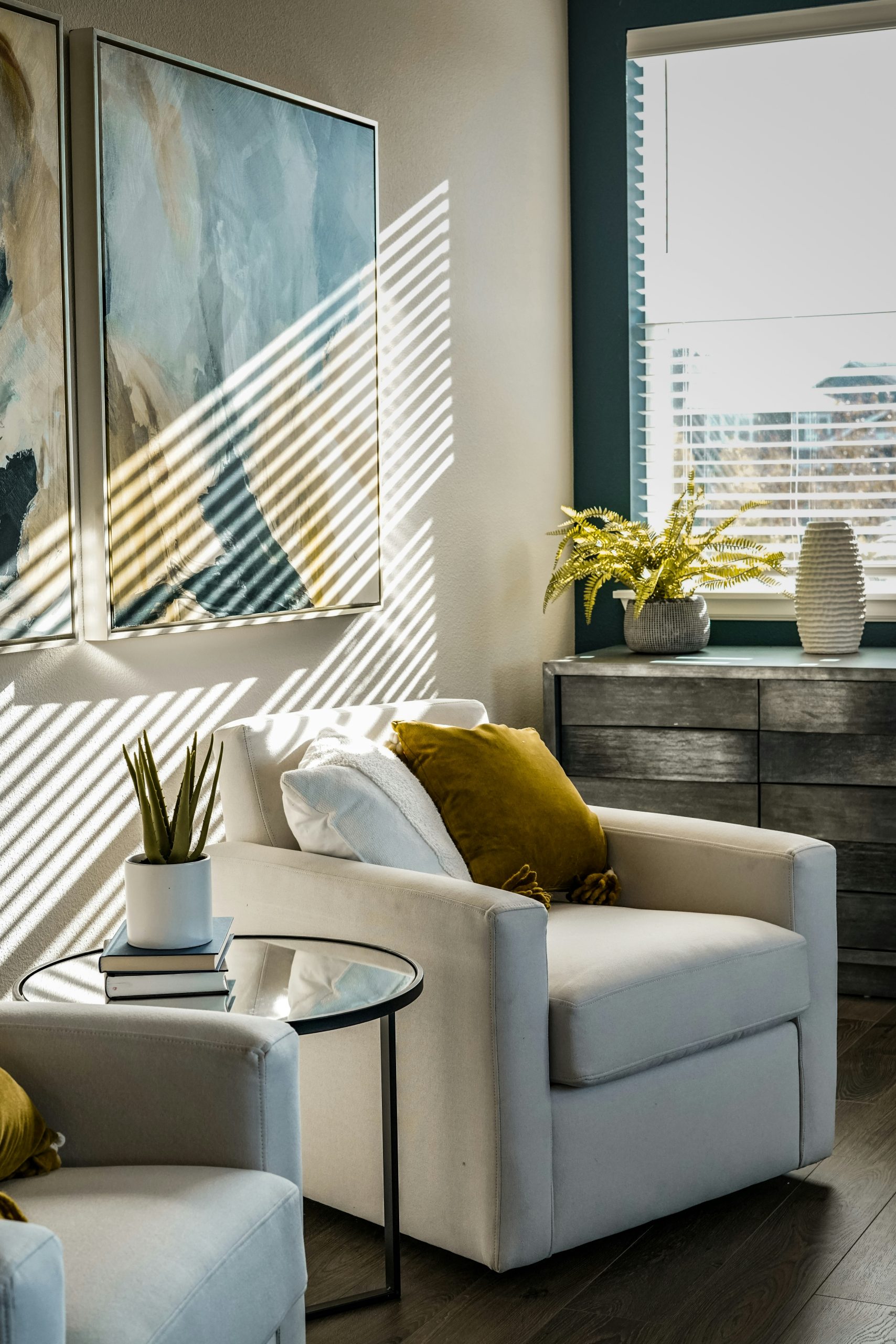 https://unsplash.com/photos/a-living-room-filled-with-furniture-and-a-painting-on-the-wall-H8ATMkhYnIo?utm_content=creditShareLink&utm_medium=referral&utm_source=unsplash