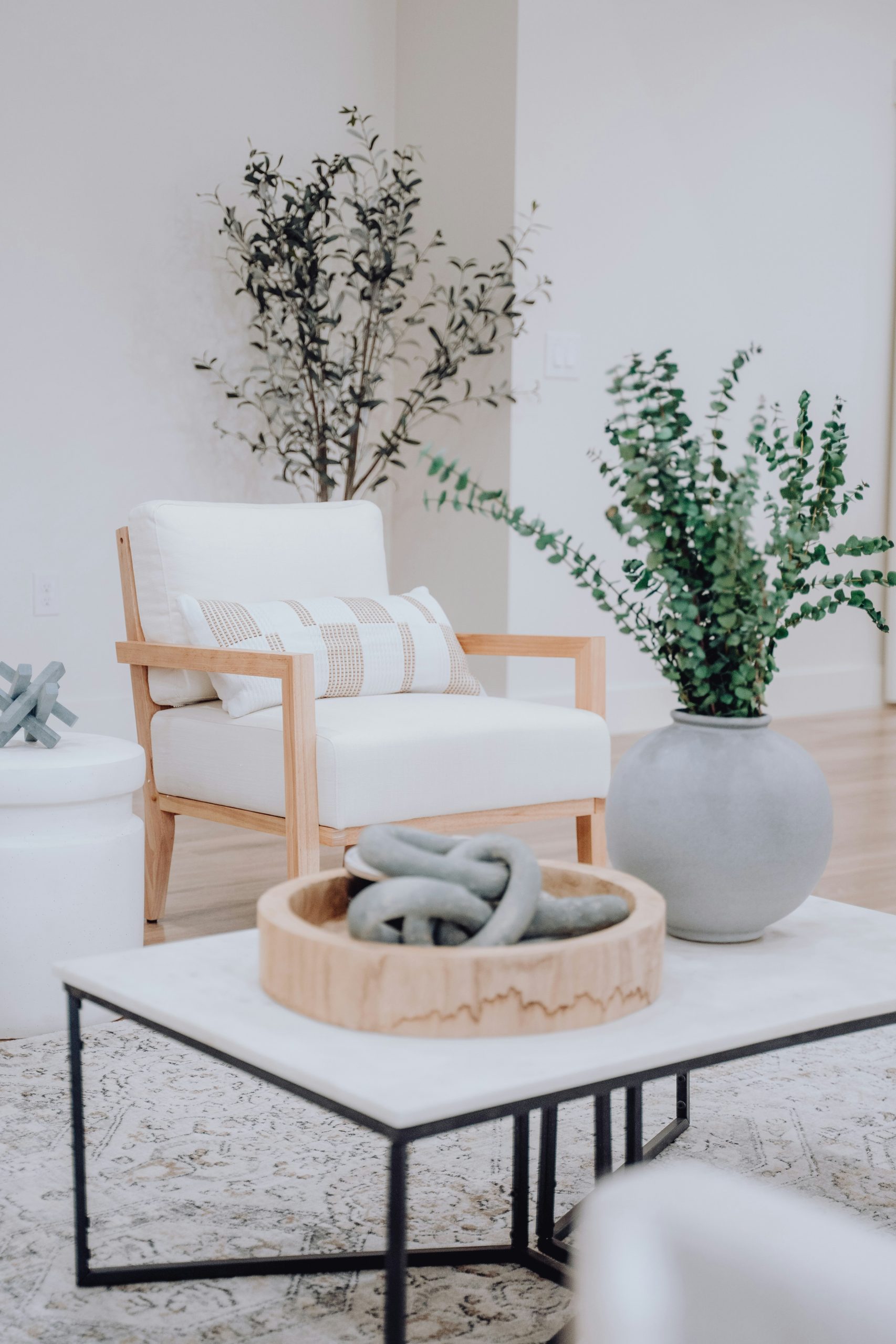 https://unsplash.com/photos/a-living-room-filled-with-furniture-and-a-plant-VKQzgxJEsJU?utm_content=creditShareLink&utm_medium=referral&utm_source=unsplash